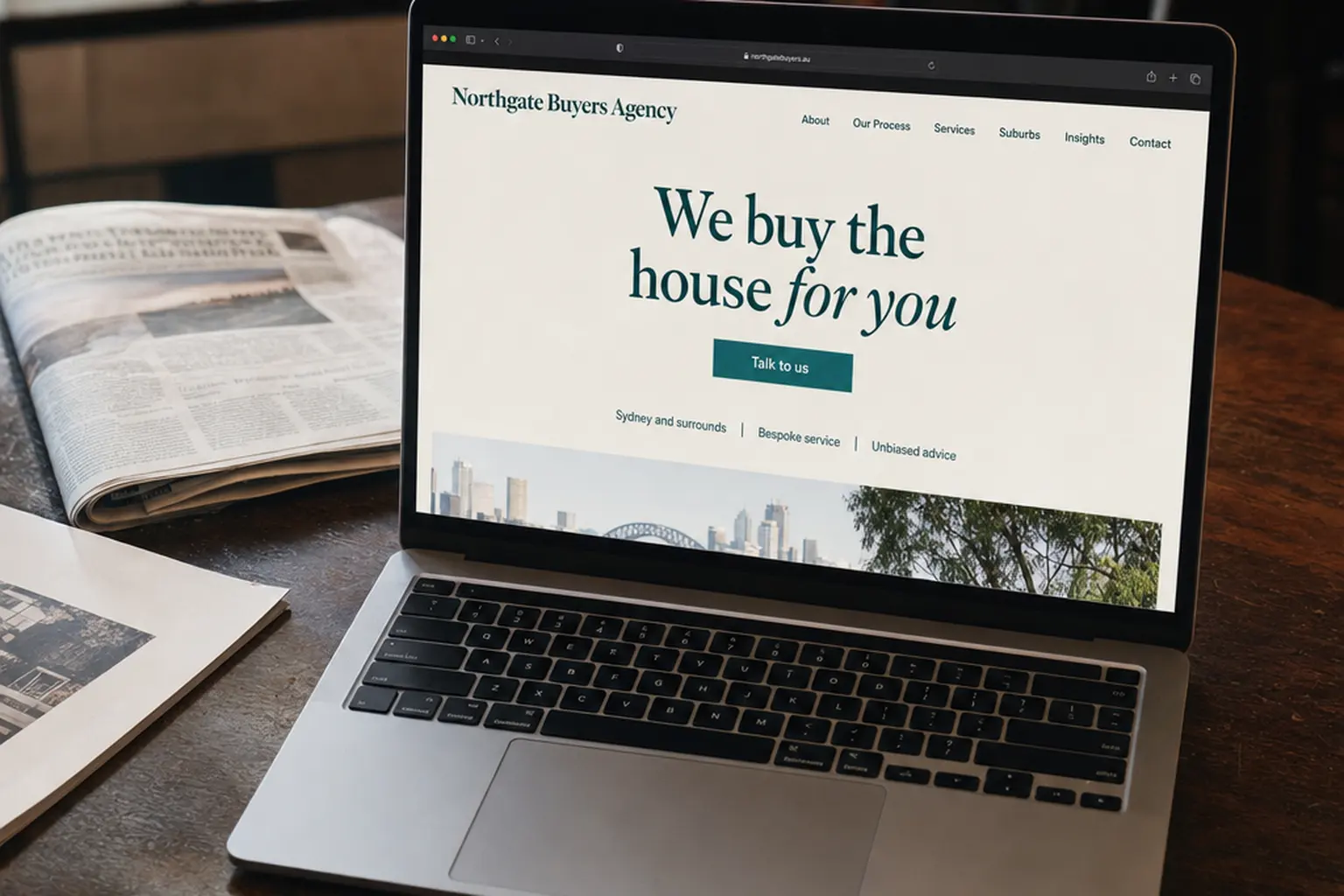 A buyers agency website concept displayed on a laptop