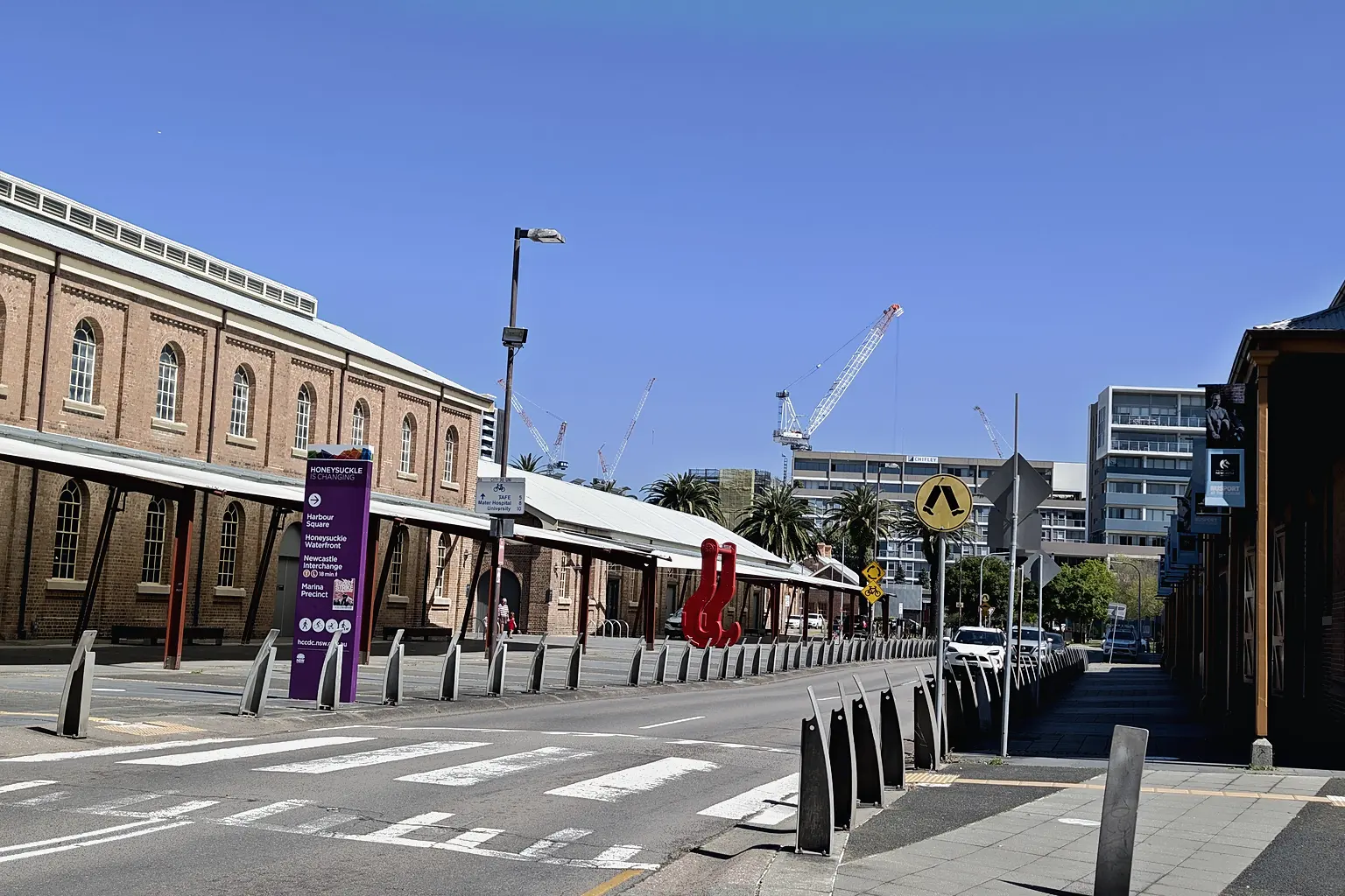 Historic buildings and a pedestrian crossing in Newcastle