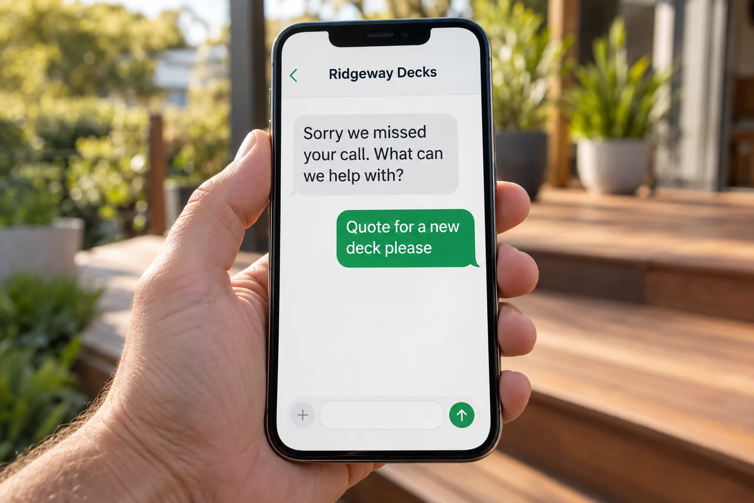 A phone showing a Ridgeway Decks missed-call text conversation concept