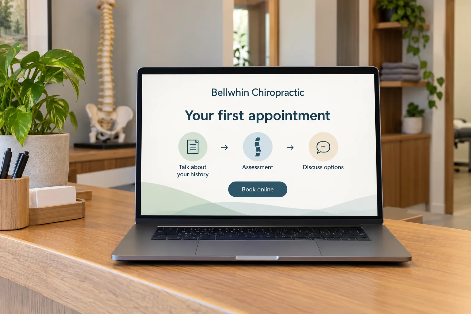 A laptop showing a Bellwhin Chiropractic first appointment page concept