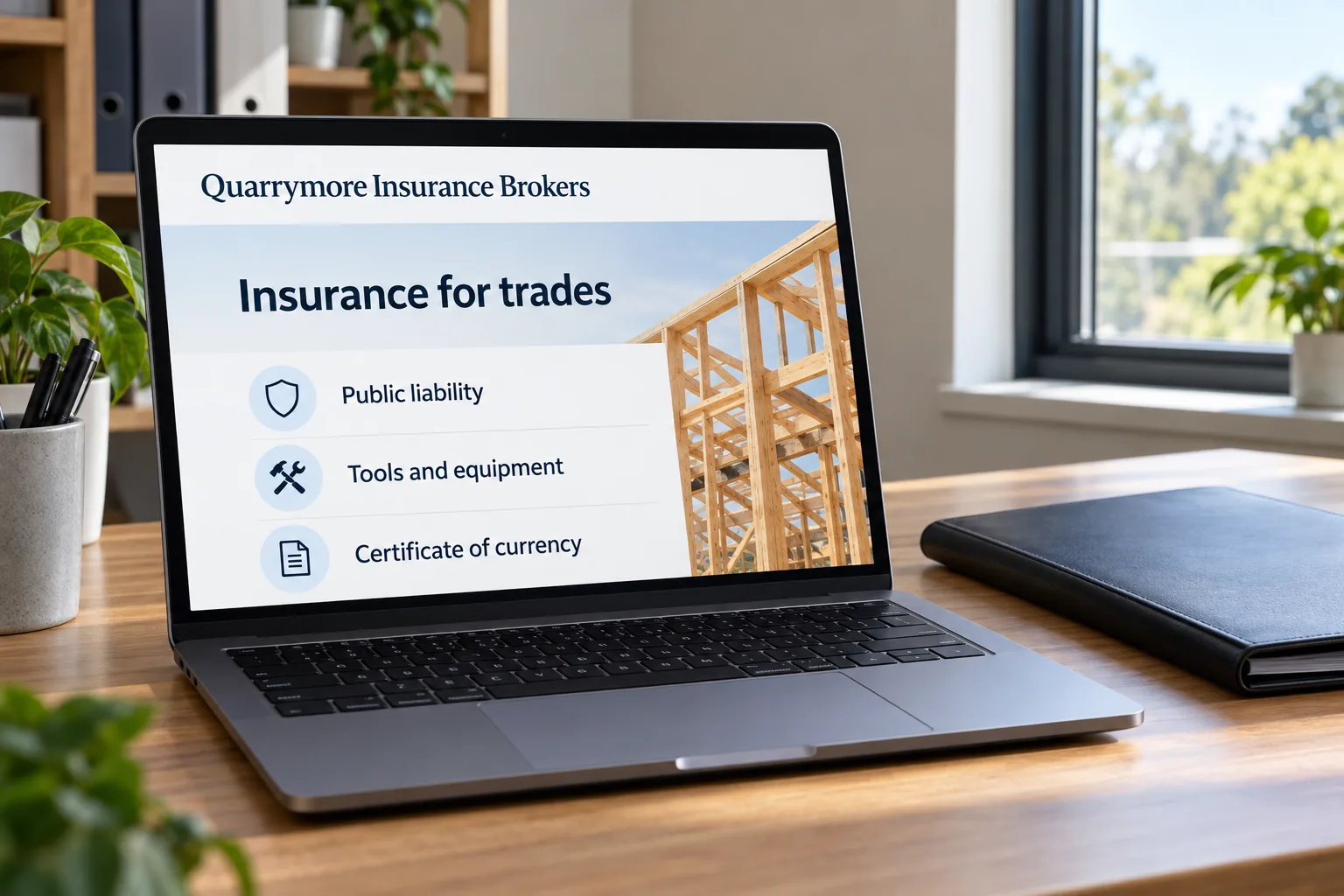 A laptop showing a Quarrymore Insurance Brokers insurance for trades page concept