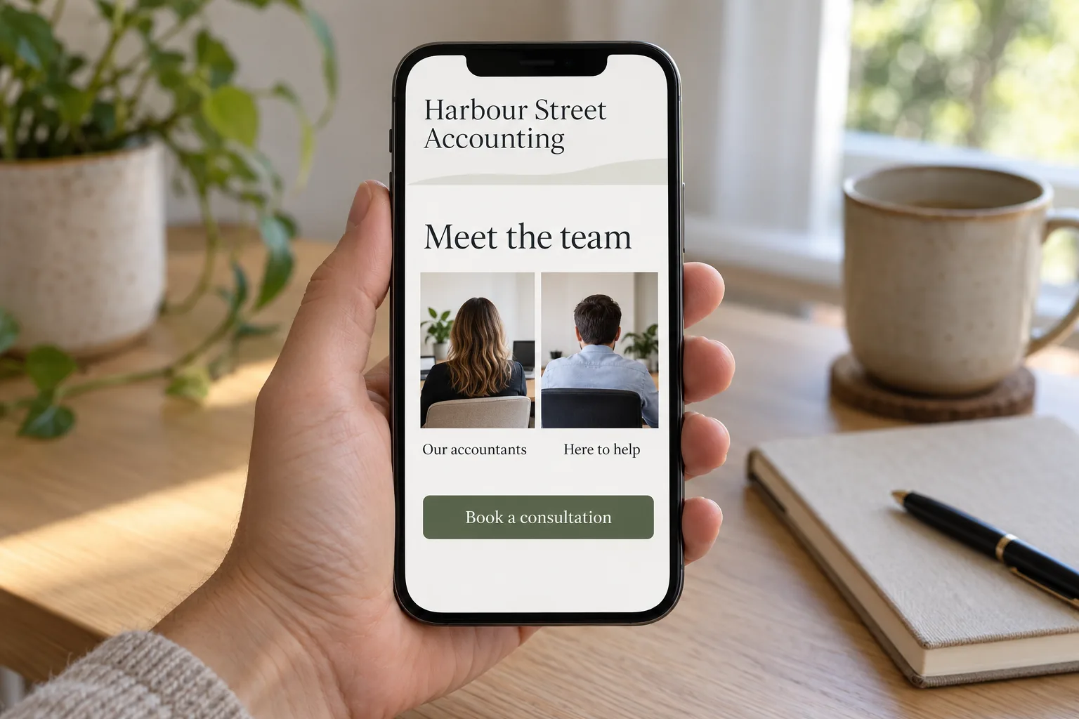 A phone showing the Harbour Street Accounting mobile website meet the team page concept